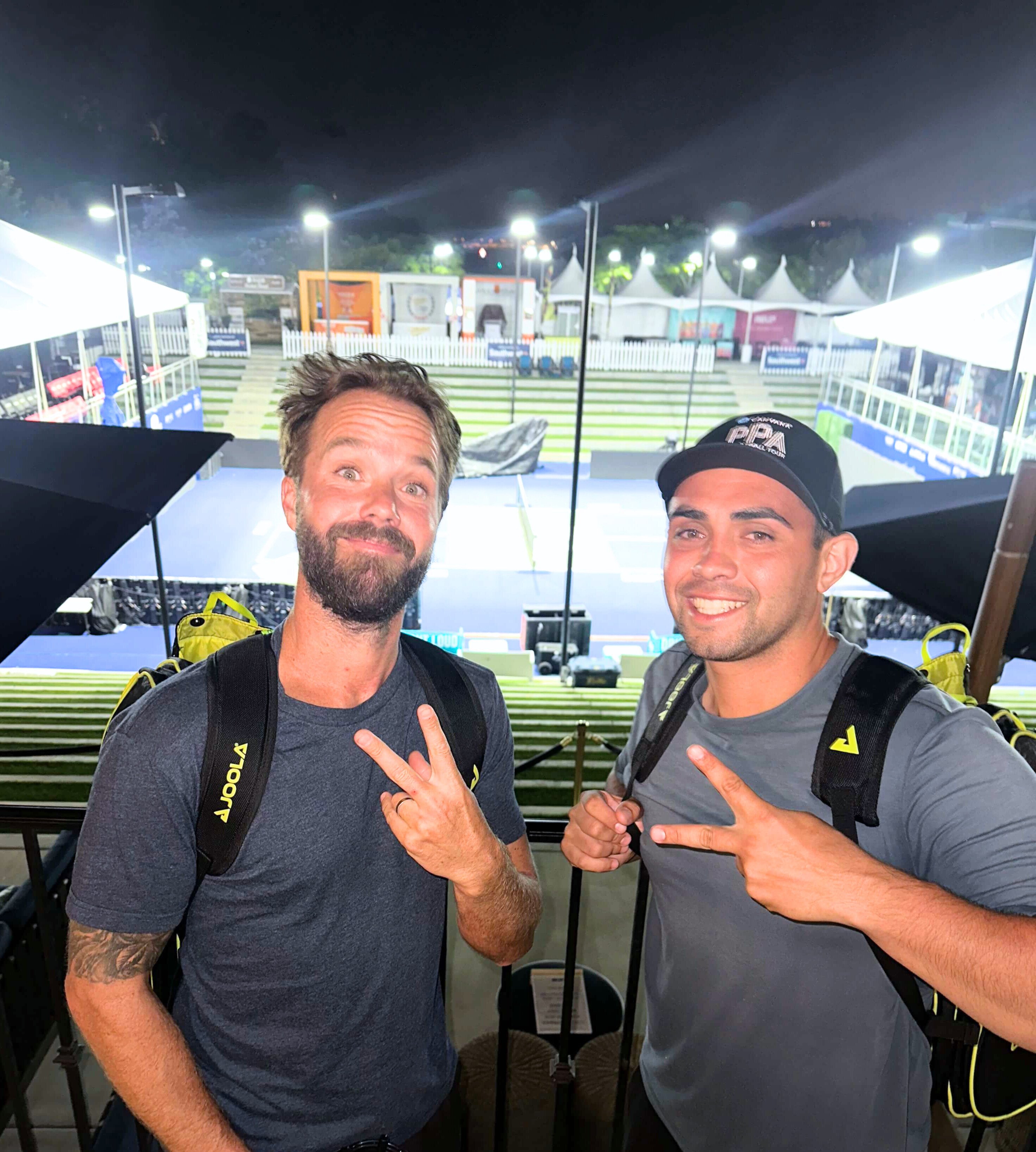 two guys at pickleball court